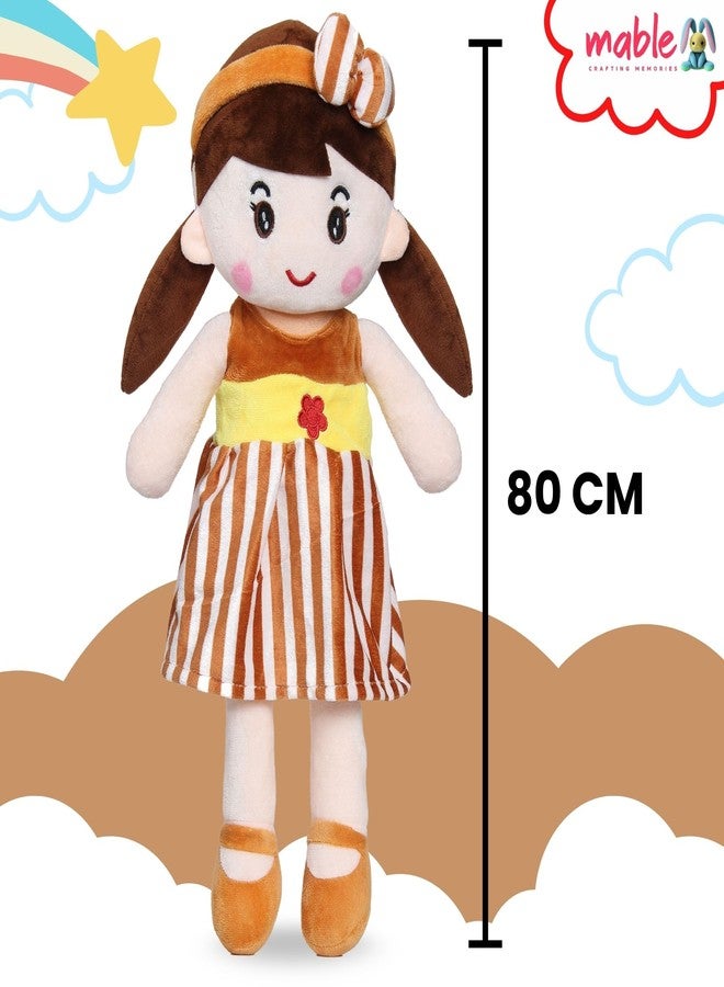 MABLE دمية مابل الناعمة للبنات | دمية طفل قطيفة لطيفة مع ربطة شعر ملونة | دمية محشوة قابلة للعناق هدية للأطفال والفتيات والرضع من عمر 3 إلى 5 سنوات (80 سم، بني) - Image 2